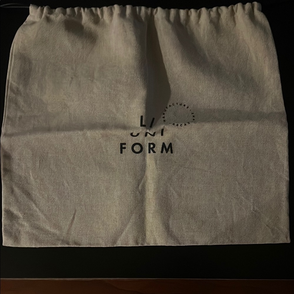 L/UNIFORM Beige Drawstring Bag